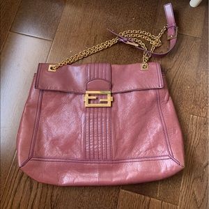 Authentic dusty dark pink Fendi purse. Gold detail.
